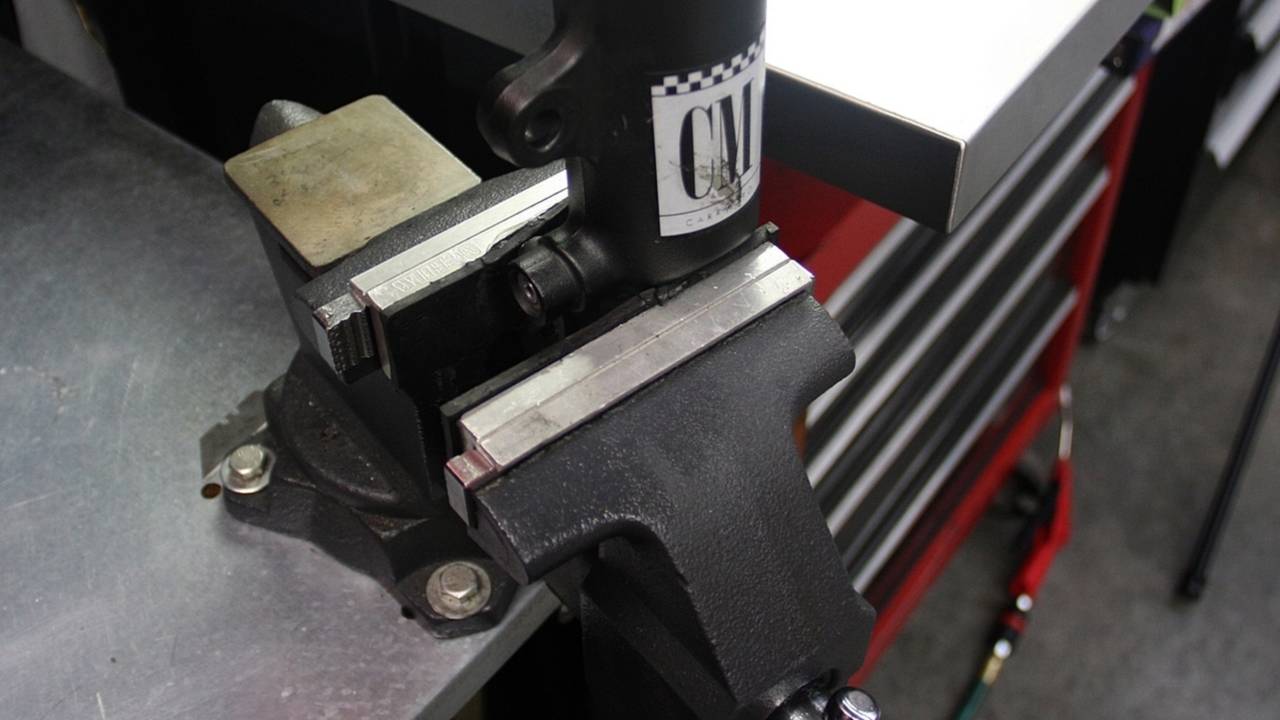 Rubber-padded aluminum vise jaw covers ensure your parts aren't scratched or damaged.