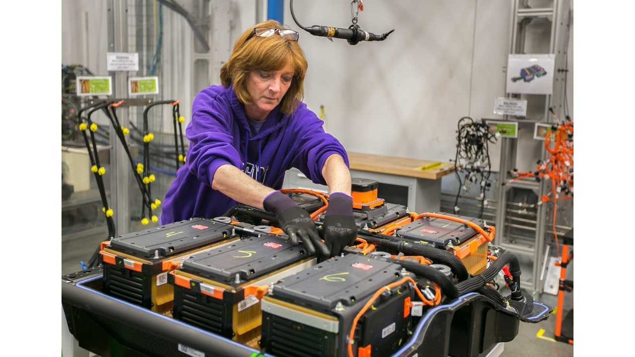 General Motors Brownstown Battery Assembly Plant worker Tina Oaks attaches wiring harnesses on a Spark EV battery pack Tuesday, May 13, 2014 in Brownstown, Michigan. GM is bringing all of its electric vehicle battery building capabilities in-house with production of battery systems for the 2015 Chevrolet Spark EV at Brownstown.