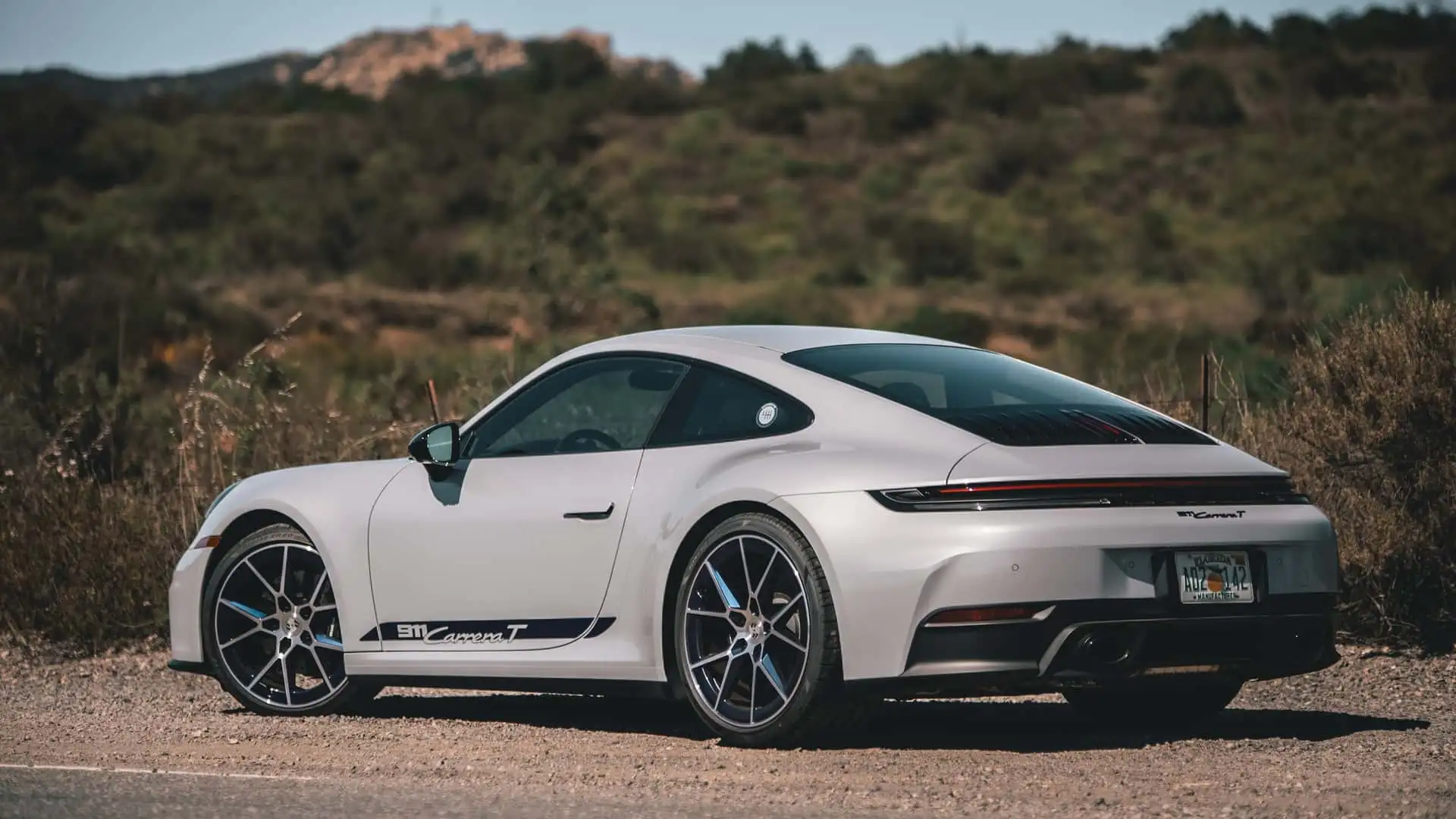 https://cdn.motor1.com/images/mgl/jlW4gR/s1/2026-porsche-911-carrera-t-review.webp