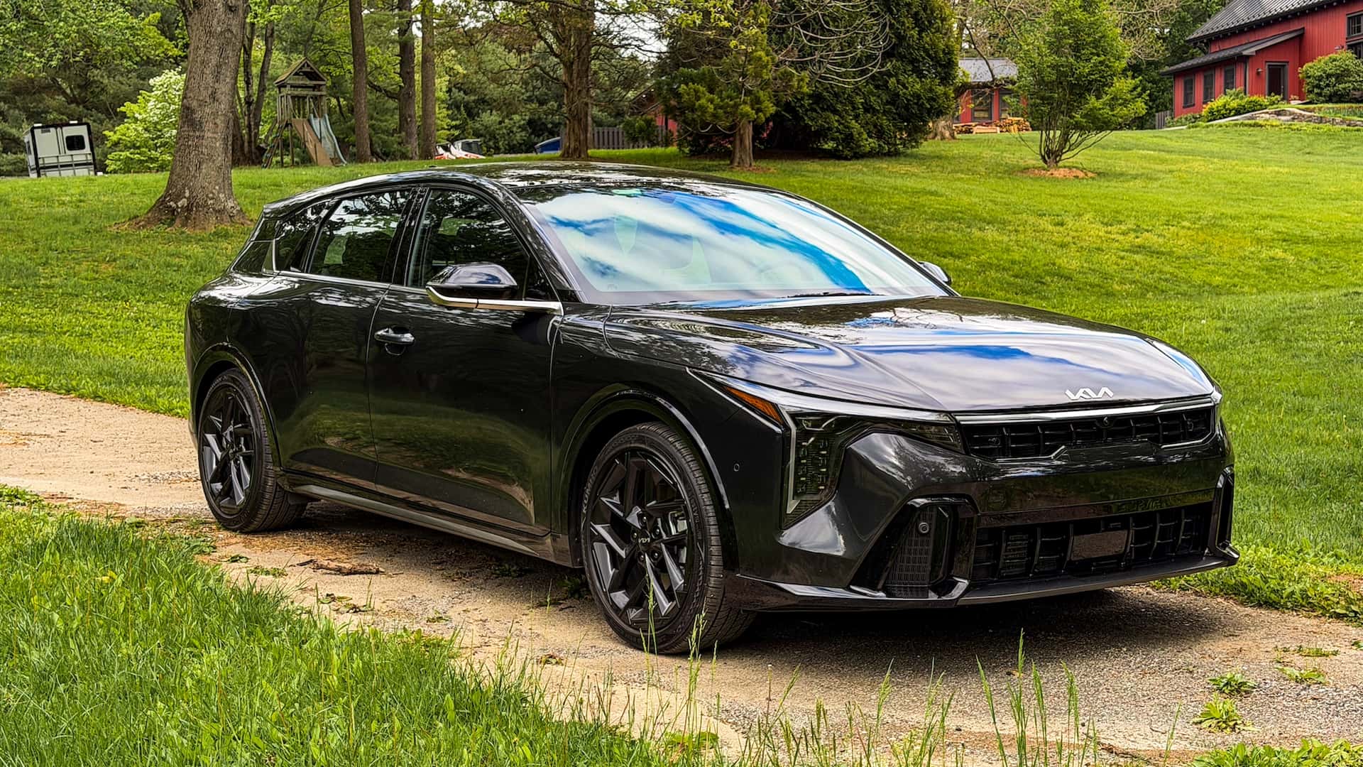 https://cdn.motor1.com/images/mgl/jlWjE7/s1/2026-kia-k4-hatchback-review.jpg