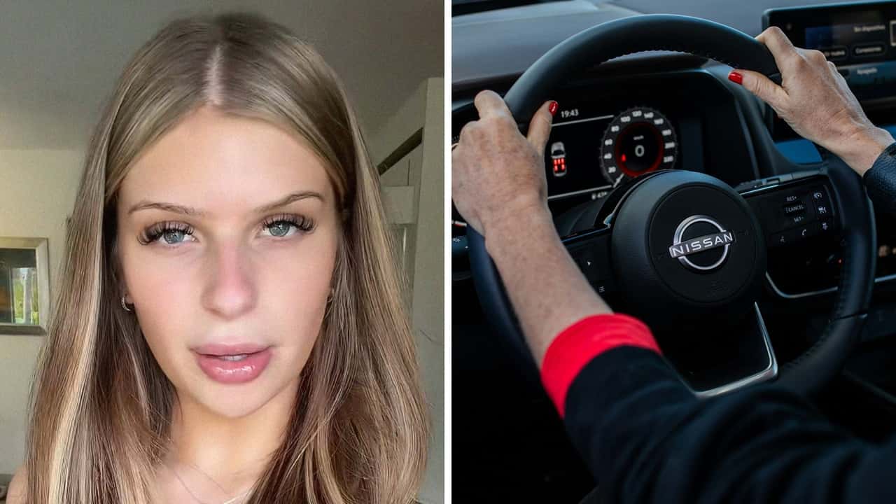 Woman goes to rental car stand