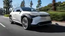2023 Toyota bZ4X Limited FWD in Elemental Silver Metallic paint front three-quarter view driving