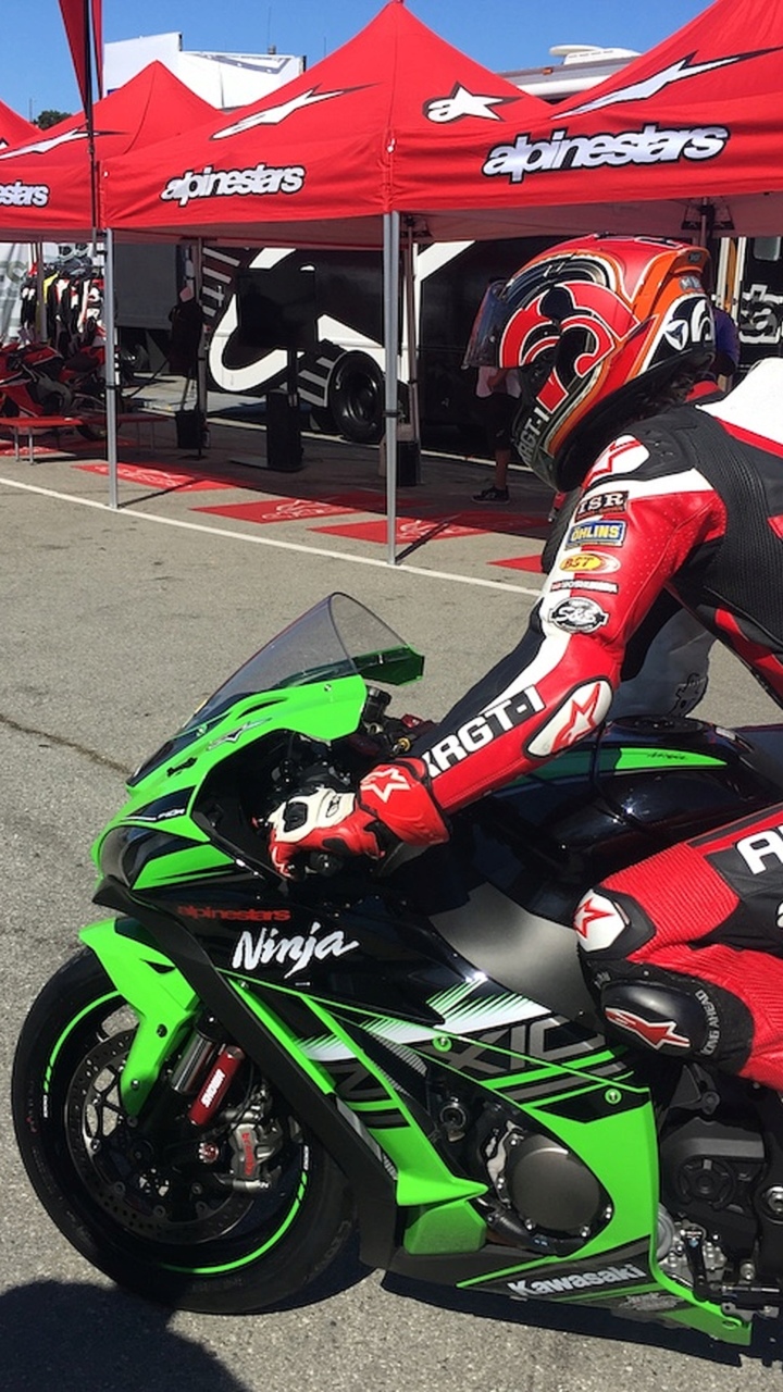 <em>This is Keanu Reeves heading out on track. He's also all about that two-wheel life.</em>