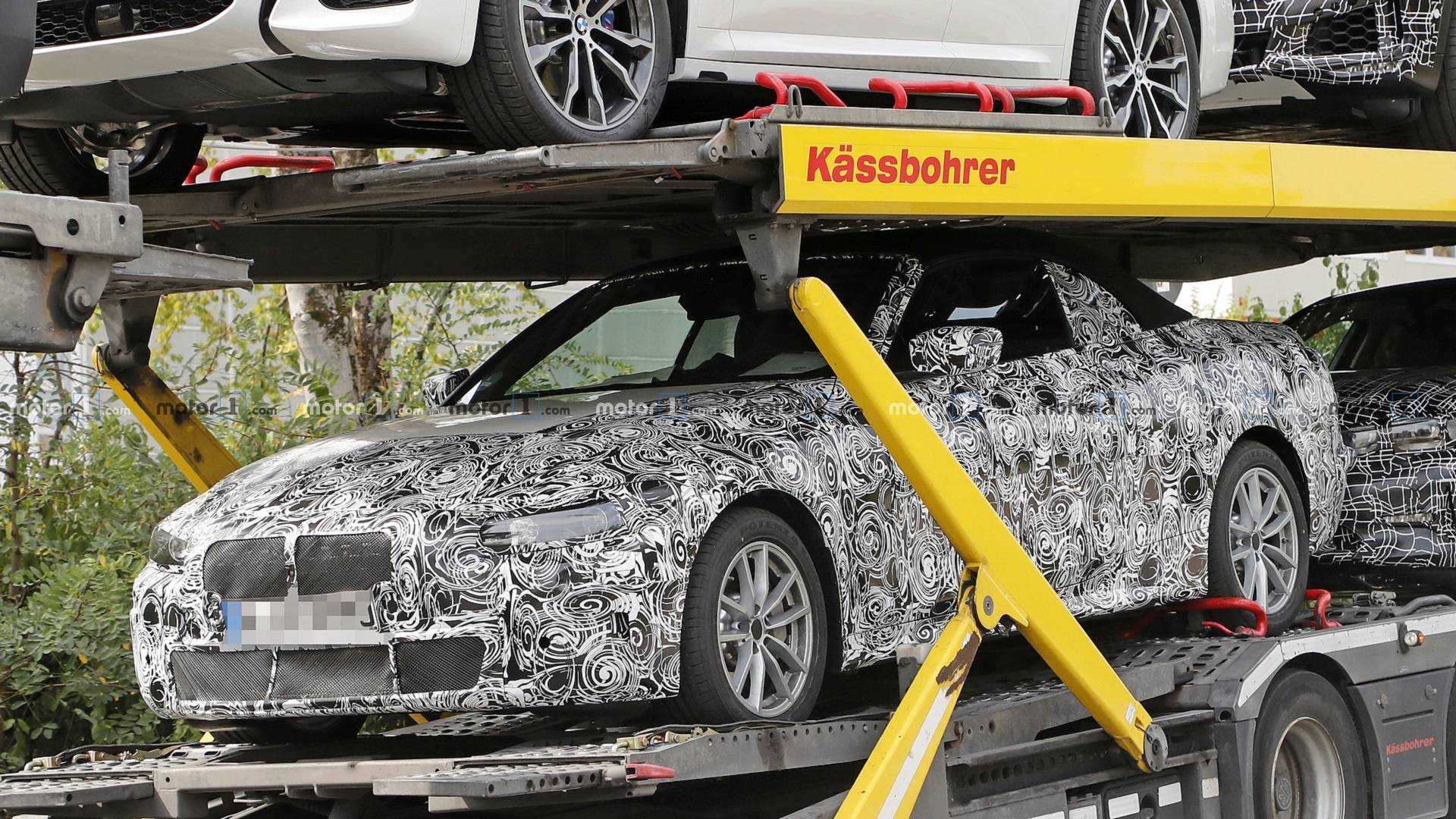 https://cdn.motor1.com/images/mgl/k283M/s1/new-bmw-4-series-convertible-spy-photo.jpg new-bmw-4-series-convertible-spy-photo