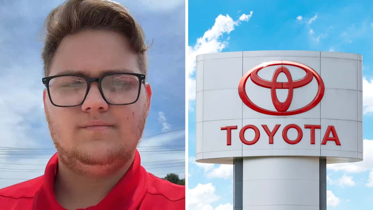Toyota salesman arrives on dealership lot