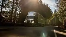Freightliner eCascadia production version front three-quarter view driving