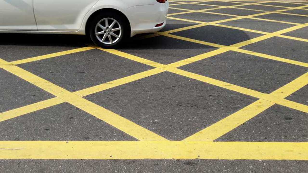 No parking yellow cross junction box zone on road