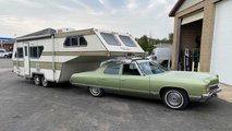 Shadow Roof-Mount RV Trailer Hooked To Chevy Caprice