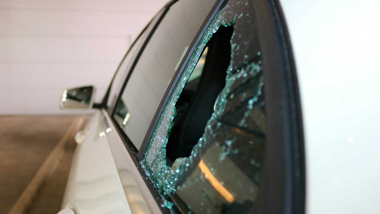 Broken car glass window from theft