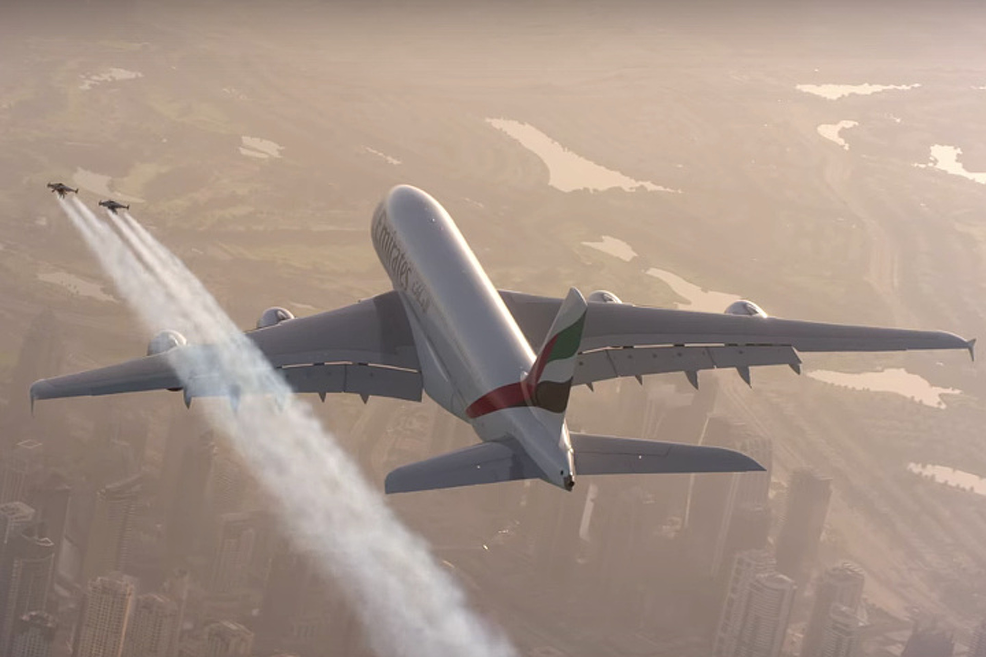 Watch Two Guys in Jet Packs Fly Alongside an Emirates Plane