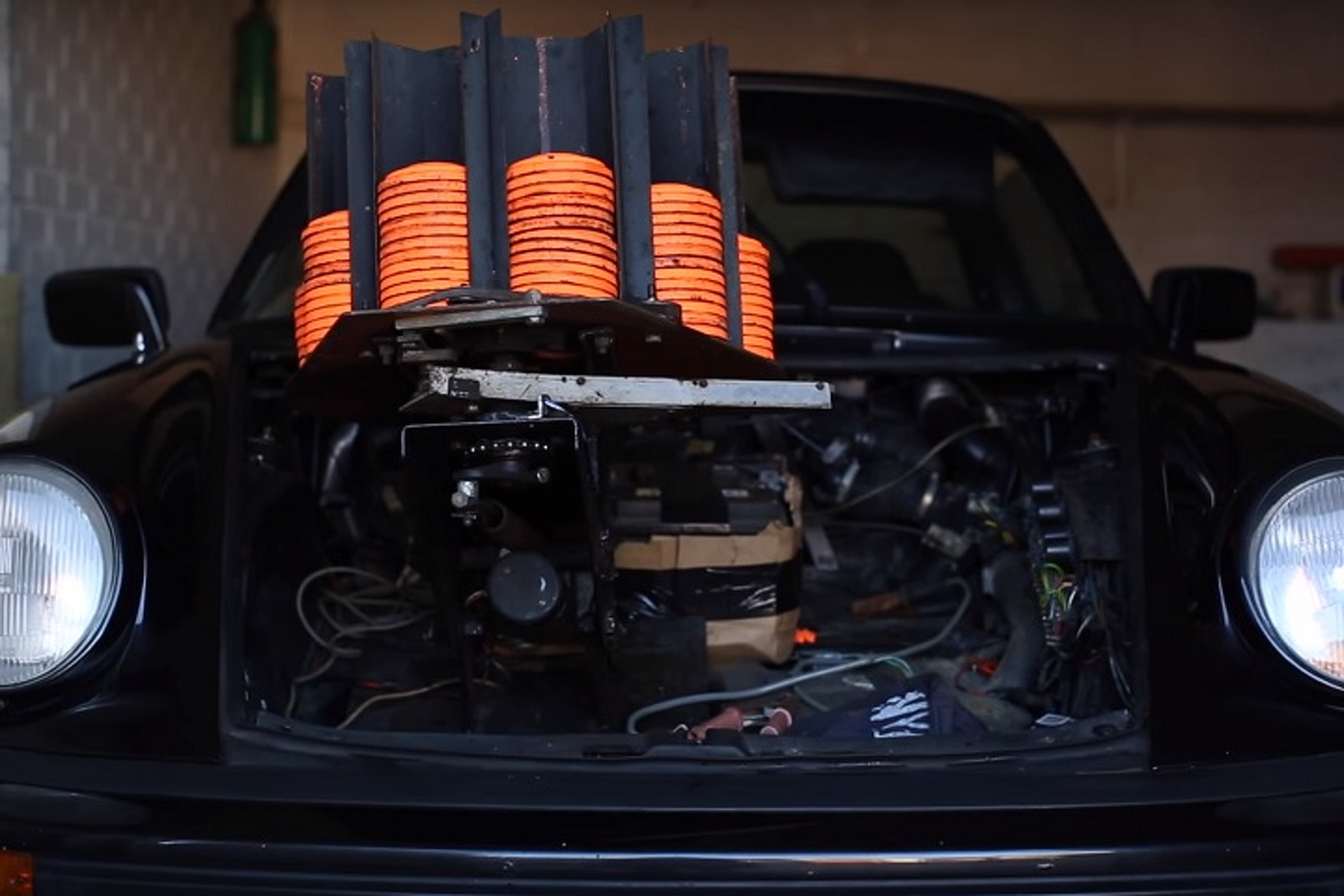Watch a Marksman Shoot From a Vintage Porsche 911