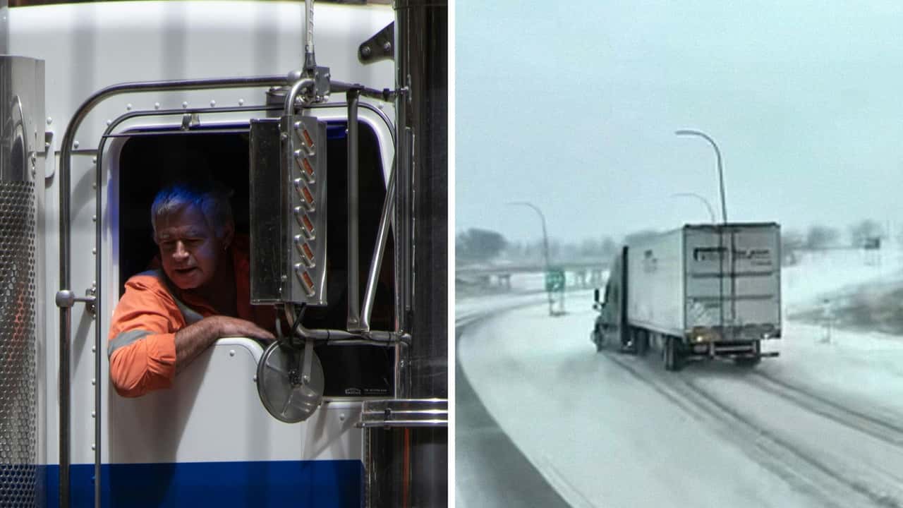 Spots 18-Wheeler On Snowy Highway