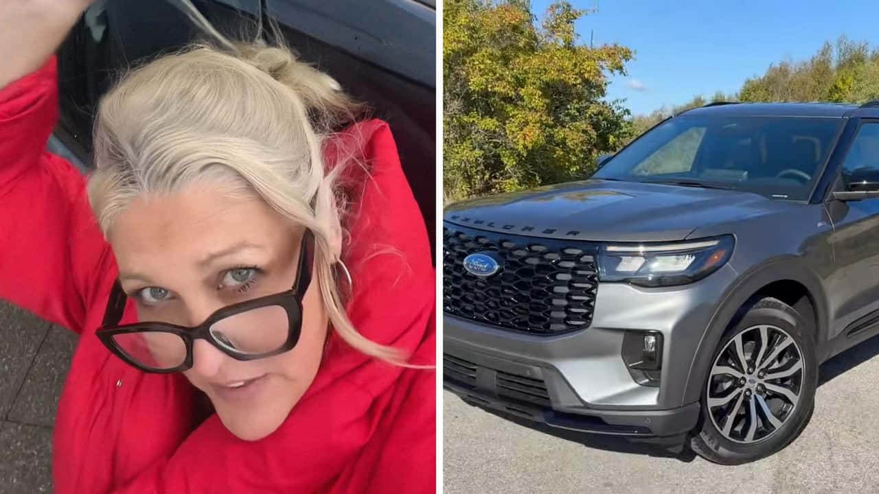 Woman checks out 2026 Ford Explorer