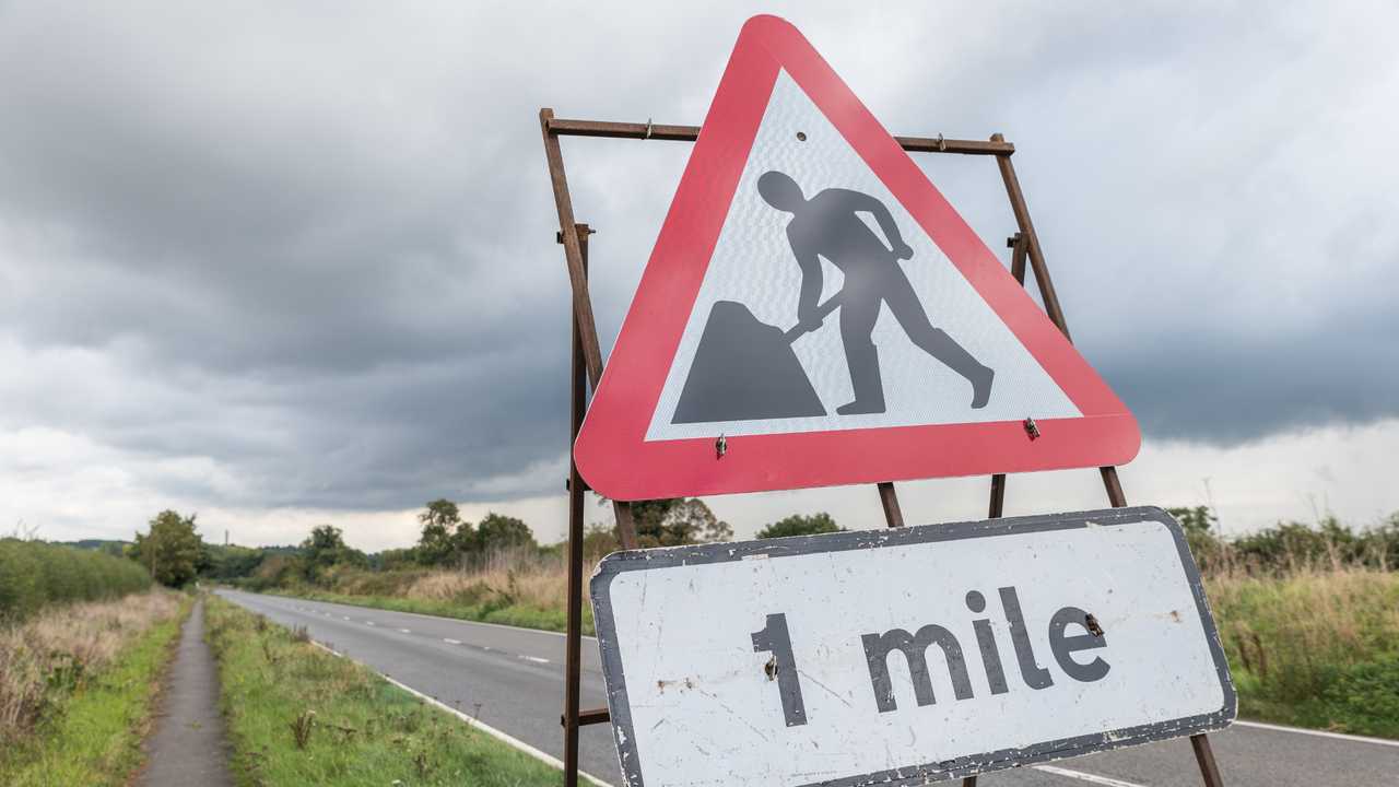 UK motorway roadworks 1 mile sign