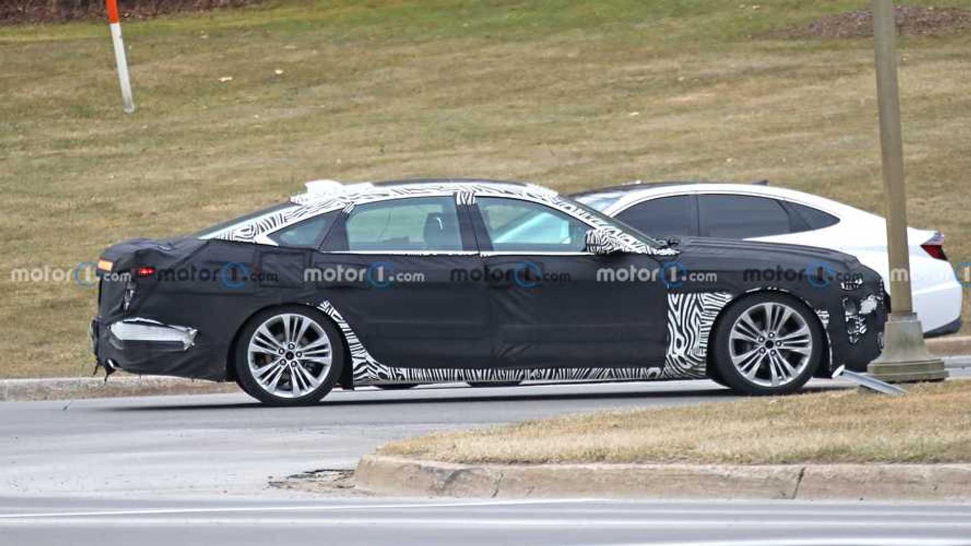 new-cadillac-ct6-side-view-spy-photo.jpg