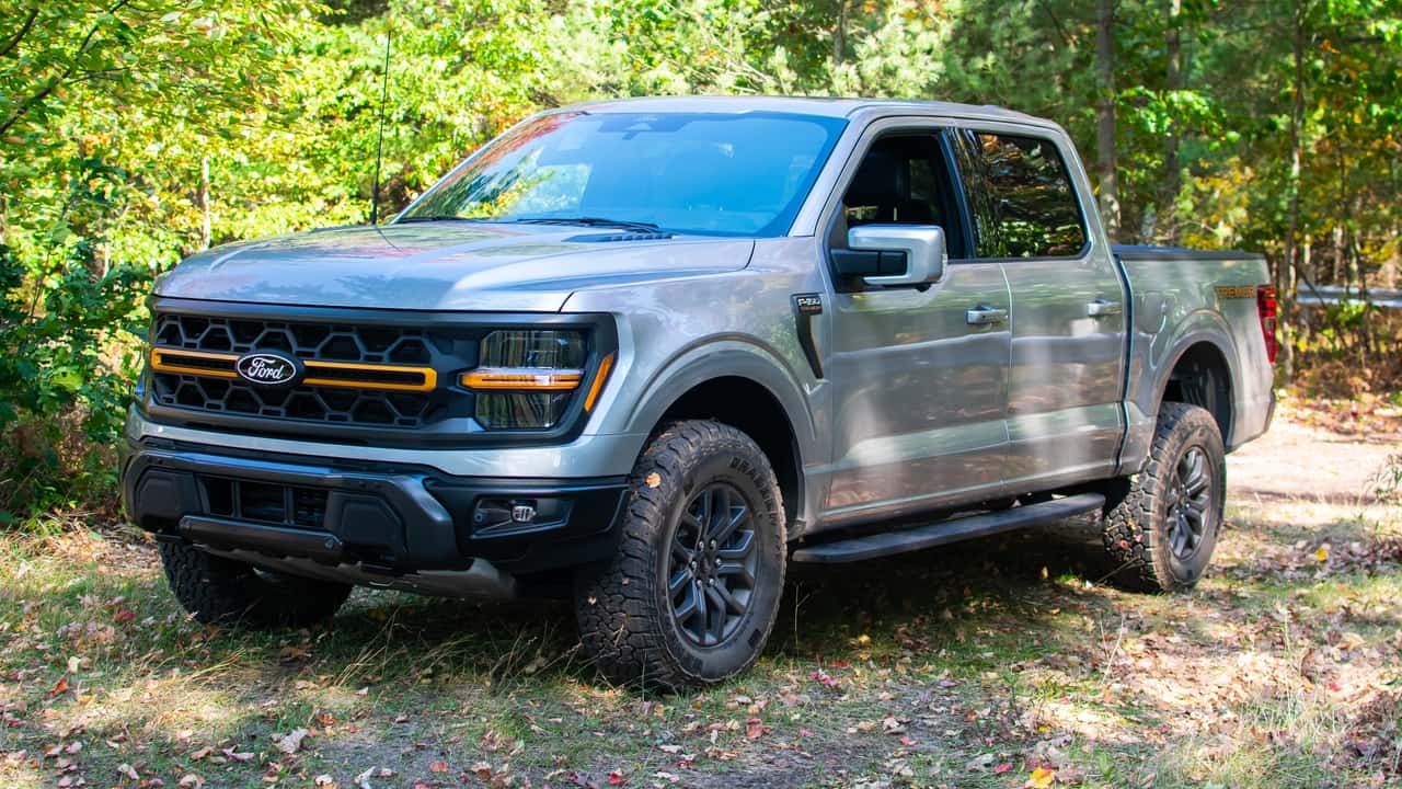 Side view of a silver Ford F-150 Tremor.