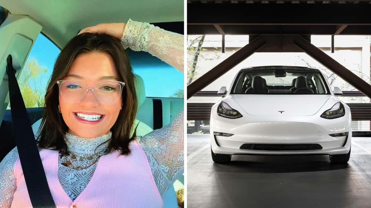 Woman sits inside her Tesla. Then it starts driving itself into an Ace Hardware parking lot