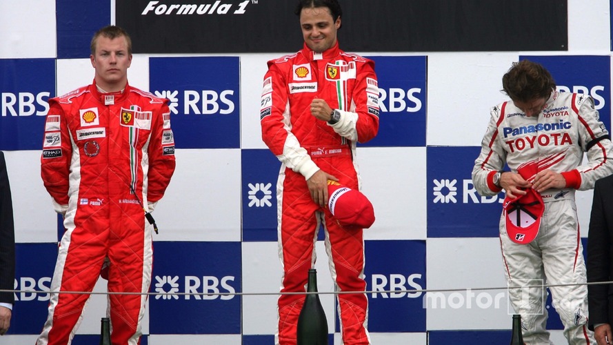 Podium: race winner Felipe Massa with Kimi Raikkonen and Jarno Trulli
