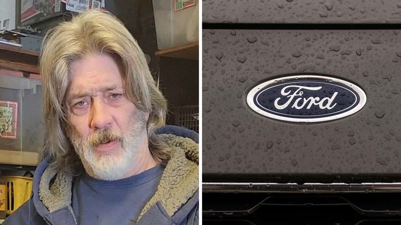 Mechanic works on Ford