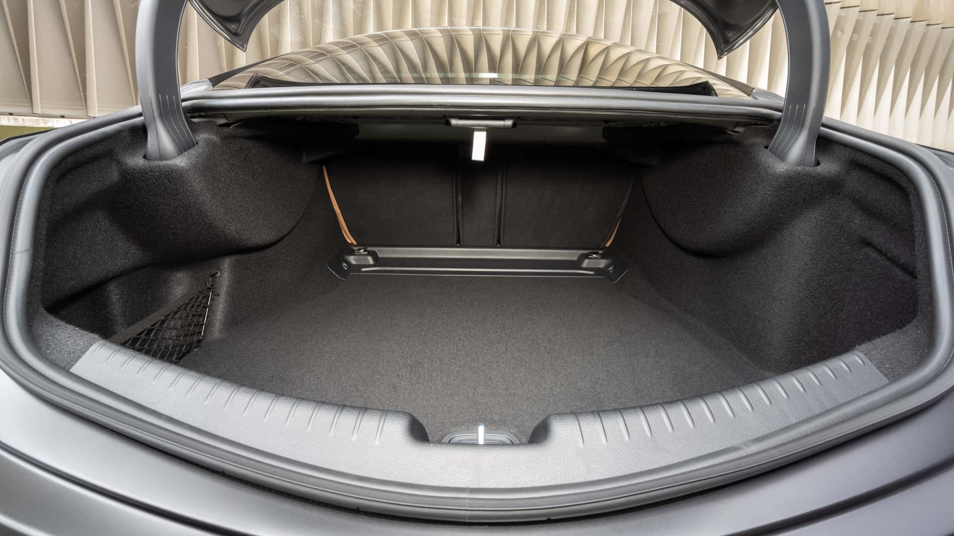 https://cdn.motor1.com/images/mgl/ojxjZ2/s1/2024-mercedes-benz-cle-class-trunk.jpg