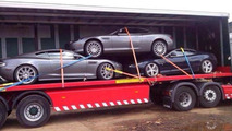 Trailer carrying 2x Aston Martin DB9 and a DBS