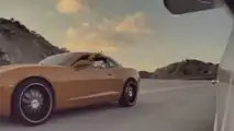 See This Camaro Driver Throw A Bunch Of Coins In a Tesla Model 3