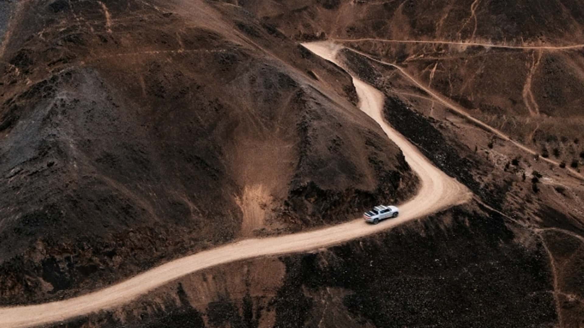 https://cdn.motor1.com/images/mgl/pb9K6v/s1/rivian-adventure-department.jpg