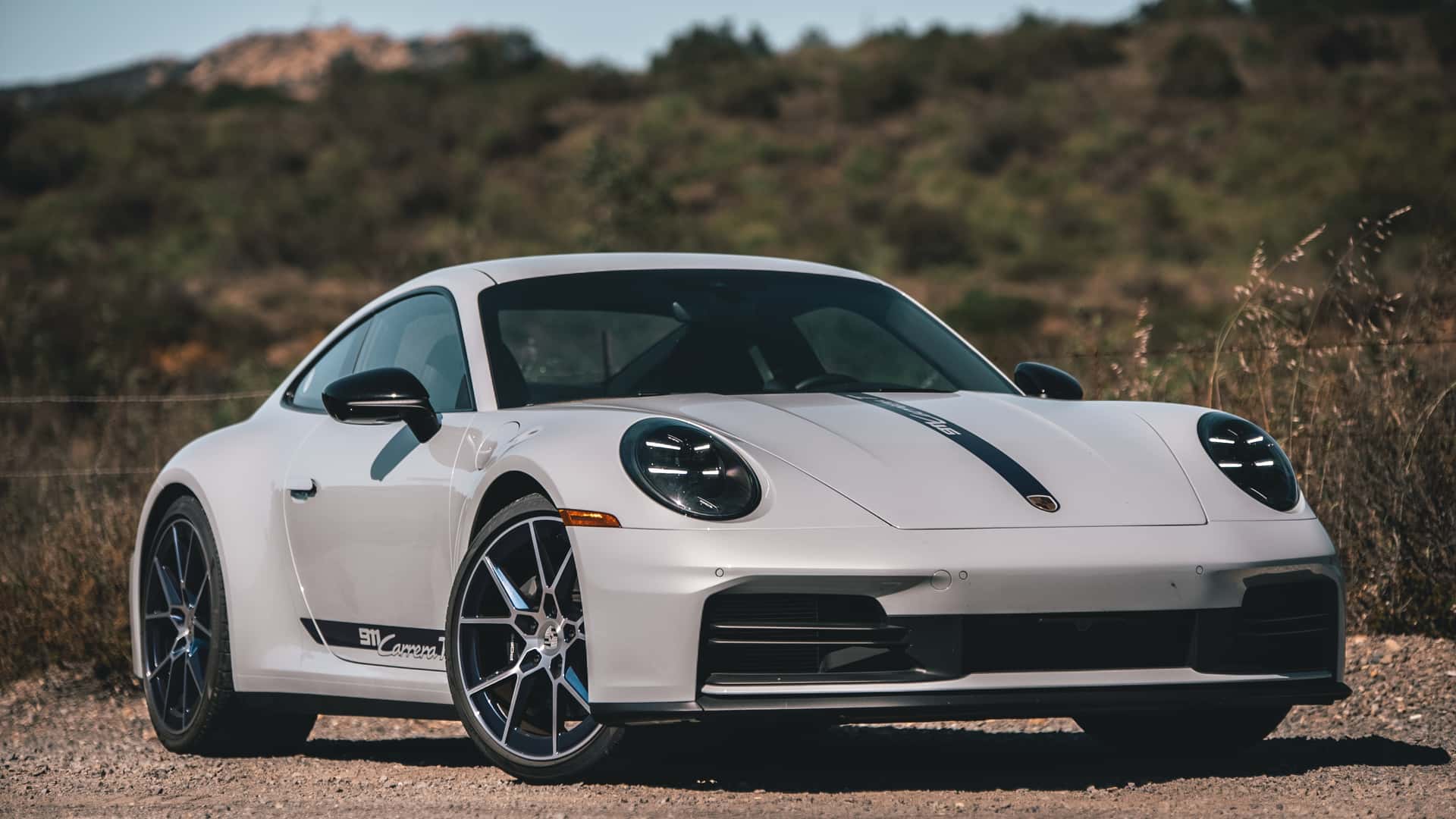 https://cdn.motor1.com/images/mgl/pbJZBg/s1/2026-porsche-911-carrera-t-review.jpg