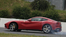 Sebastian Vettel with the Ferrari F12berlinetta