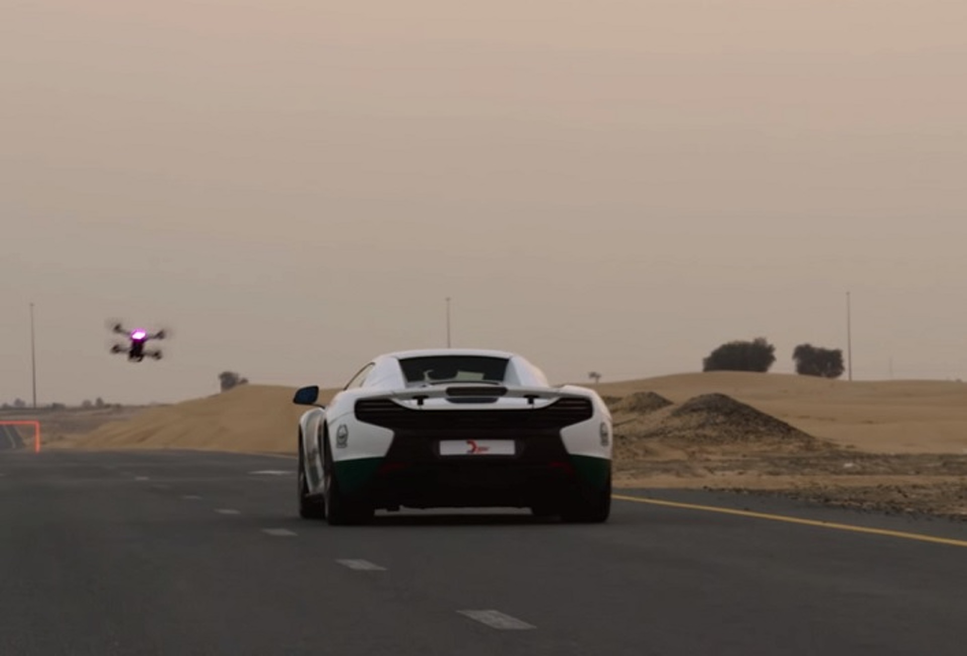 Watch a Dubai Police McLaren Race a Drone Because Why Not