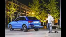 Q3 mit Longboard für die Stadt