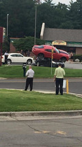 Chevrolet Camaro and Subaru Outback crash
