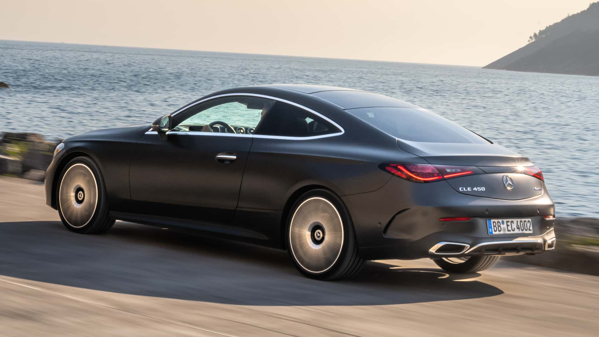 https://cdn.motor1.com/images/mgl/qkMkO1/s1/2024-mercedes-benz-cle-class-exterior-rear-quarter.jpg