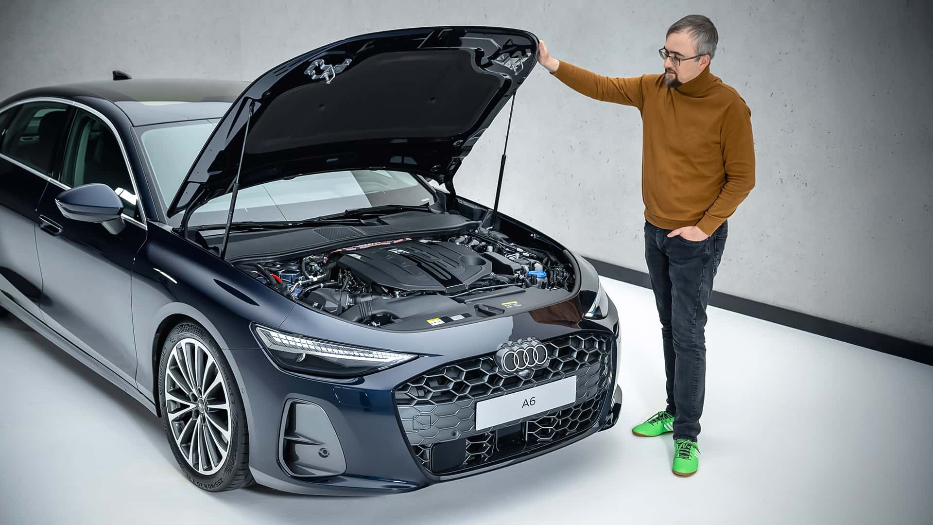 https://cdn.motor1.com/images/mgl/qkqB4v/s1/audi-a6-limousine-2025.jpg