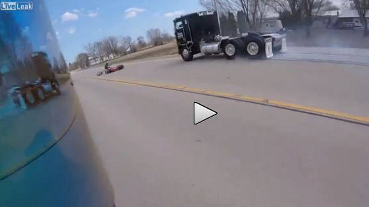 Bike v Dog + Giant Truck - Video of the Day