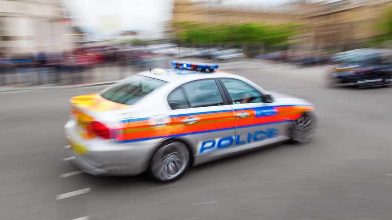 Police car in London in motion