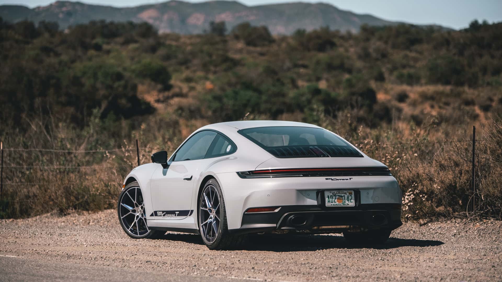 https://cdn.motor1.com/images/mgl/vx8vWY/s1/2026-porsche-911-carrera-t-review.jpg
