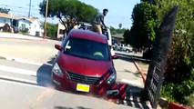 Owner of Nissan Altima tries to free his car