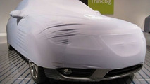 2010 Saab 9-5 with car cover