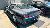 Ferrari 550, BMW M5 e Ford GT in un garage