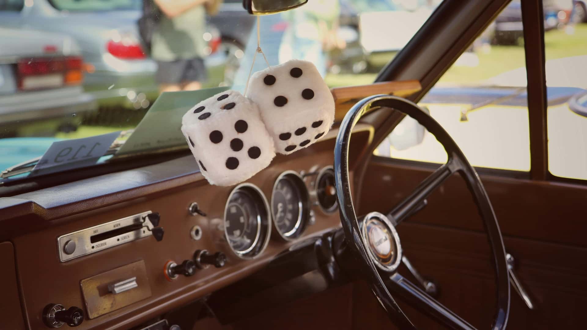 Those Fuzzy Dice Hanging In Cars Have WWII Origins