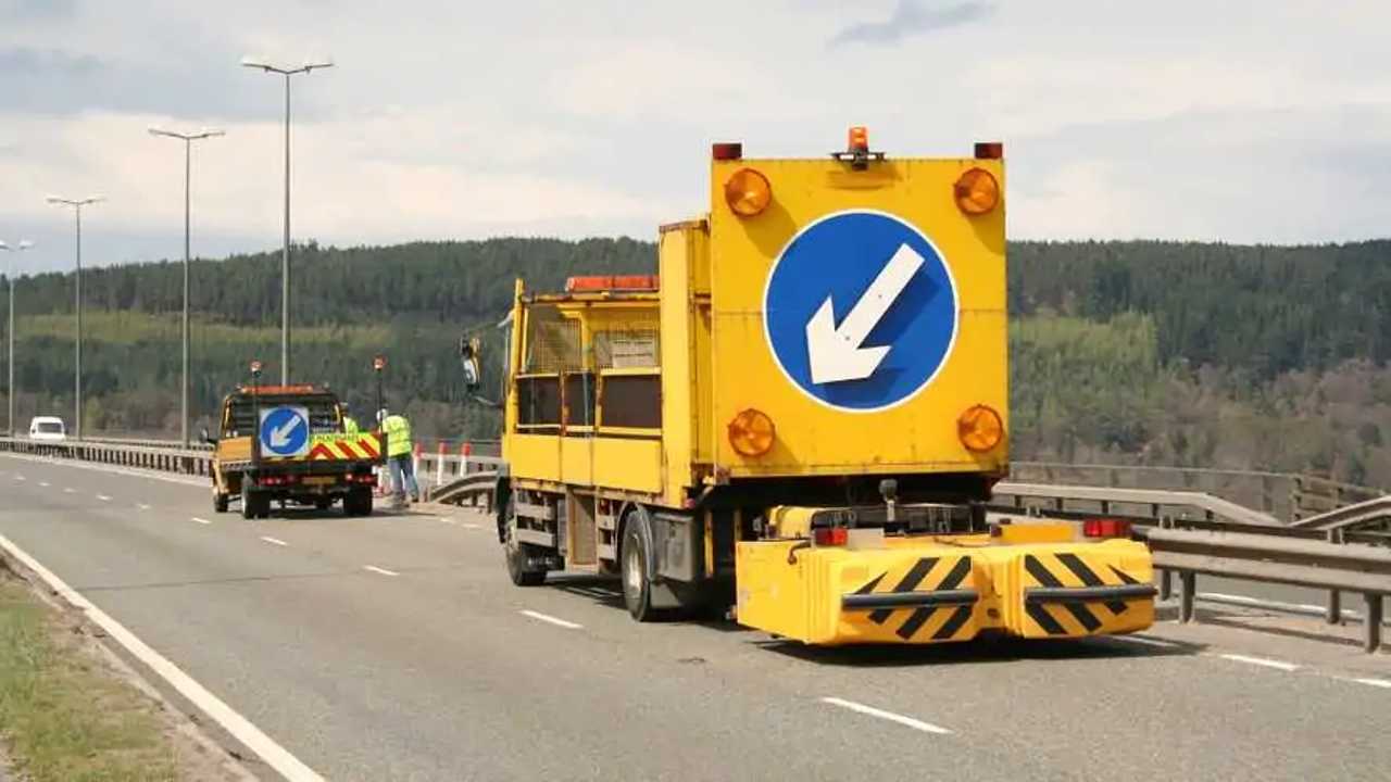 Lane closed vehicle with arrow sign