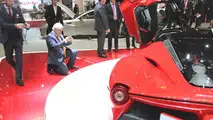 McLaren chief designer Frank Stephenson taking a photo of the LaFerrari at 2013 Geneva Motor Show