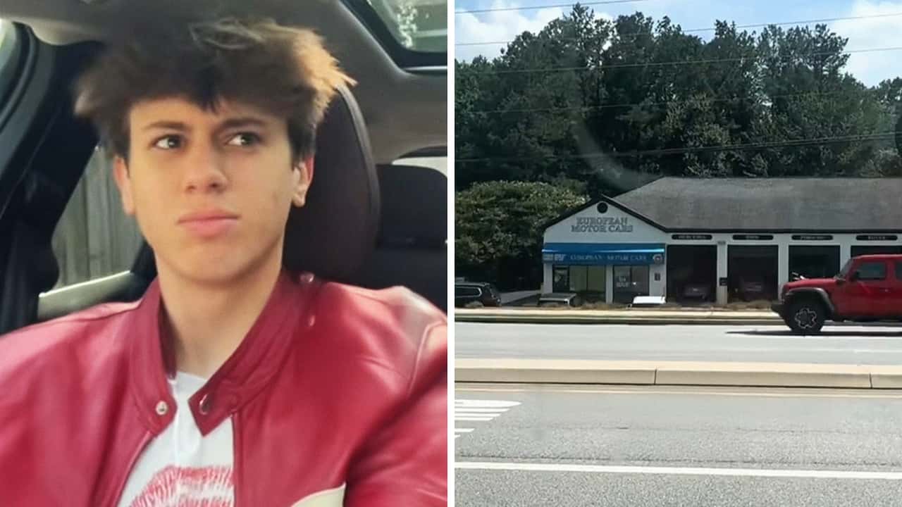 Man drives by European automotive shop. Then he notices something about 1 bay in particular