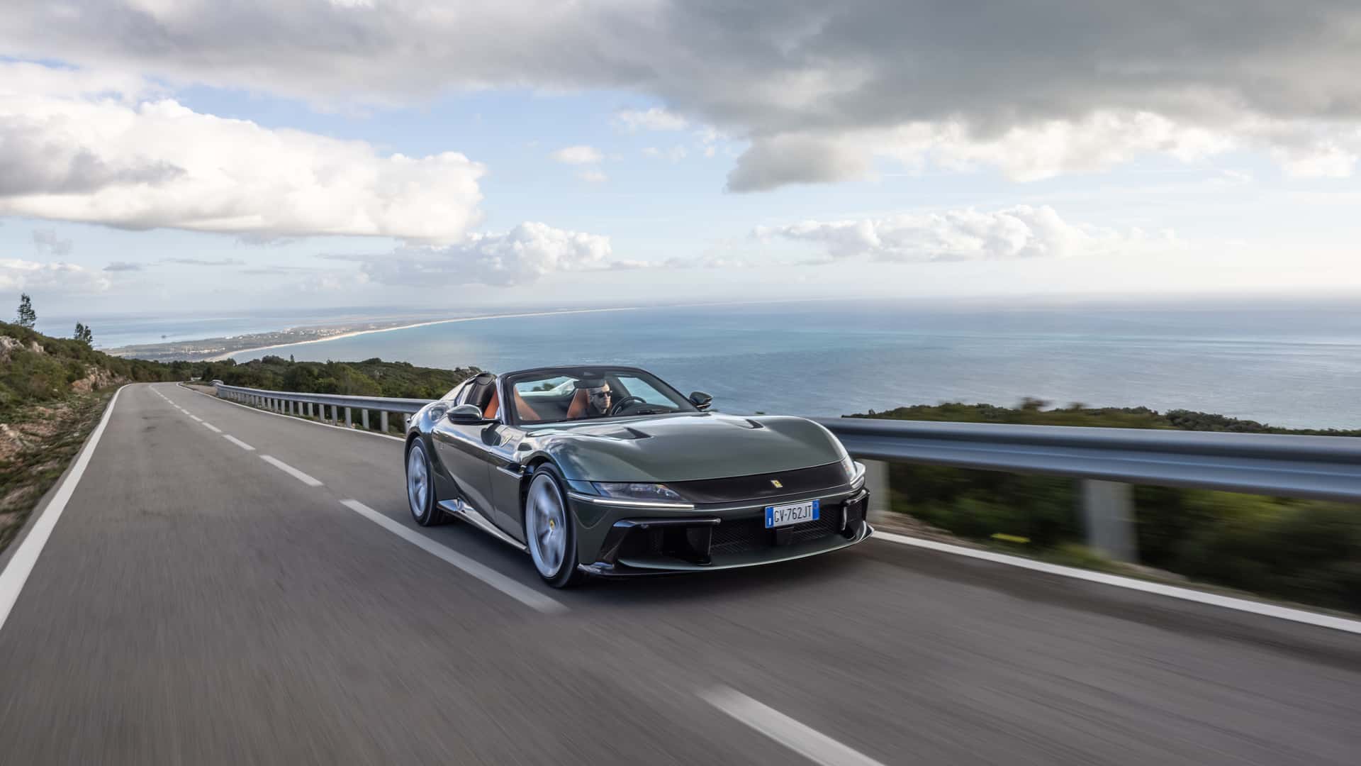 https://cdn.motor1.com/images/mgl/xqAgqq/s1/2025-ferrari-12cilindri-spider-first-drive-review.jpg