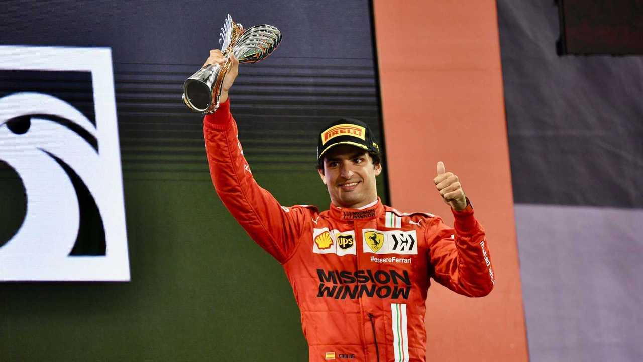 Carlos Sainz Jr., Ferrari, 3rd position, lifts his trophy