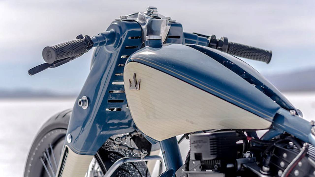 From close up, the horizontal stripes in the white sections of the bike's livery can be seen