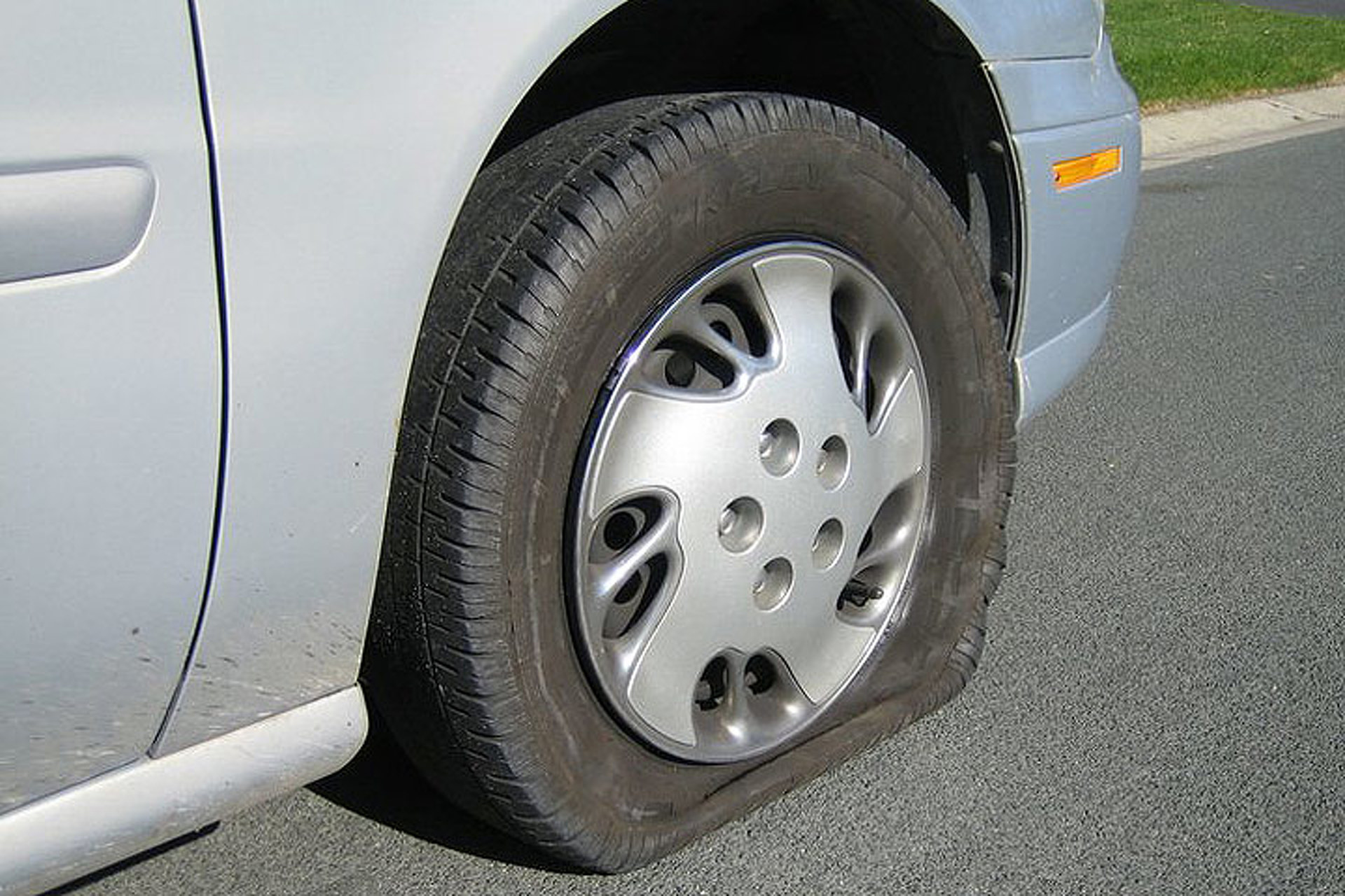 Changing a flat tire Changing a flat tire