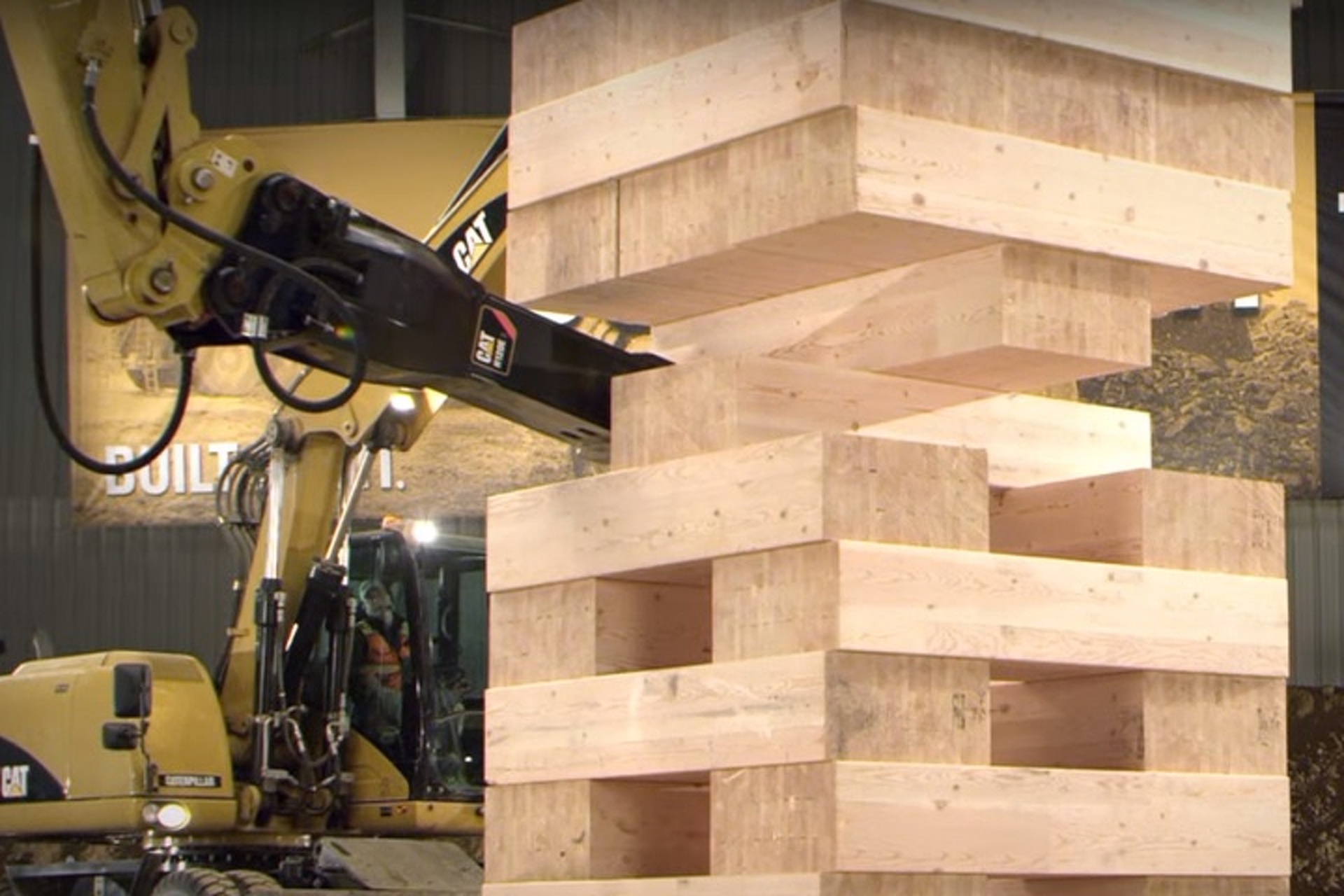 Watch a Game of Jenga Using Caterpillar Construction Vehicles