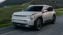 2024 Kia EV9 in US specification exterior front three-quarter view driving